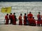 Young Buddhist Monks Waiting for Boat