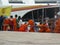 Young Buddhist Waiting to Board Boat