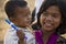 Young burmese Family. Brother and sister smiling