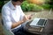 young buseness man work on the table with his laptop