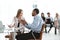 Young business colleagues talking behind a Desk