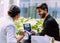 Young business couple meeting with tech devices