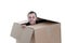 Young business man hiding in a cardboard box