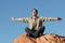 Young business man meditating