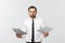 Young business man serious writing on clipboard, Handsome businessman wear elegant suit and tie isolated over white