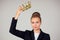 Young business woman put on the crown on head. Leadership, success concept