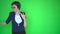 Young business woman or teacher in business clothes and wearing glasses, chroma key green screen background