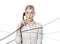 Young business woman tied with phone cord