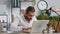 Young businessman with anxiety checking time on clock, running late to work being in delay deadline