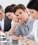 Young businessman bored at a presentation