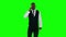 Young businessman cell phone. Green screen