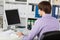 Young Businessman At Desk