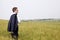 Young businessman in field