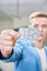 Young businessman holds a credit card in his hands. concept of success, startup