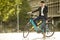 Young businessman on the Kettler Quadriga CX10 ebike with mobile phone