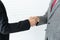 Young businessman shakes hands and agrees to cooperate in business. / business concept / cooperate work / successful job