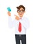 Young businessman showing credit, debit, ATM card and pointing finger. Person holding digital payment card. Male character design.