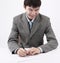 Young businessman signing a contract of employment. isolated on a white background.