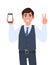 Young businessman in vest suit showing a blank screen mobile phone and gesturing victory, peace, V sign. Person holding smartphone