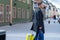 Young businessman walking through town