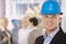 Young businessman wearing hardhat