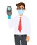 Young businessman wearing medical mask and showing credit card payment machine. Person in eye glasses holding POS terminal.