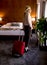 Young businesswoman arrives in a hotel room with red suitcase