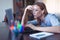 Young businesswoman focusing on work at laptop