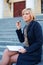 Young businesswoman with notebook.