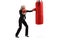 Young businesswoman punching in a boxing bag