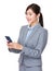 Young businesswoman read on mobile phone