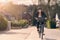 Young businesswoman riding to work on a bicycle