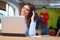 Young busineswoman sitting in the office with laptop