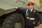 Young cadet with an armored troop carrier