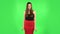 Young calm woman relaxing, meditating. Girl refuses stress and takes situation, calms down, breathes deeply. Greenscreen