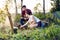 Young camping couple cooking meal