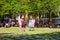 Young Canadian couple looking at a painting in peace park or place de la paix in Montreal, Quebec, Canada