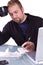 Young Casual Businessman Working at his Desk