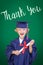 Young Caucasian Boy In Graduation Cap and Gown Against Green Chalkboard Background With Thank You