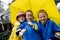 Young caucasian children playing in the rain