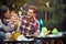 Young caucasian couple with cute little girl at birthday party