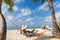 Young caucasian couple in hammock in Maldives, Tropical beach.