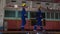 Young caucasian engineer man and woman walking check and maintenance train in station.