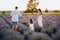 Young Caucasian Family in Purple Lavender Field