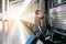 Young Caucasian girl with luggage at station traveling by train