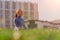 A young Caucasian girl practices yoga meditation in the fresh air. The concept of peace of mind