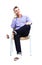 Young caucasian handsome man sitting on the chair isolated