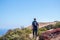 Young caucasian male traveler trekking at Concon sand dune in Vina del Mar, Chile