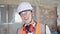 Young caucasian man architect smiling confident standing at construction site