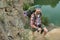 Young caucasian man with backpack climbing the